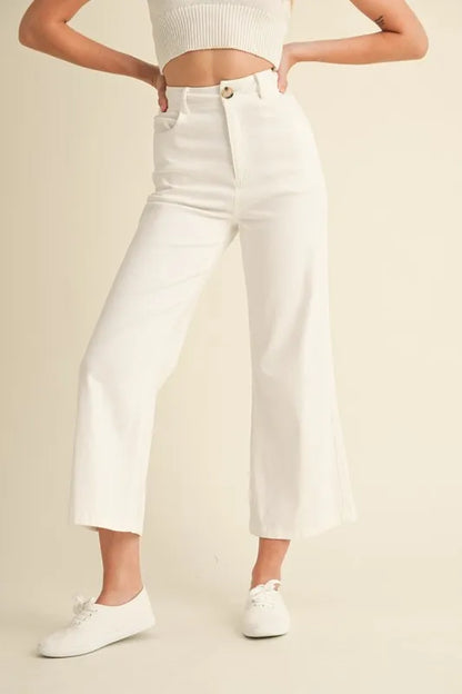 White high rise pants with side pockets, comfortable and stylish fit